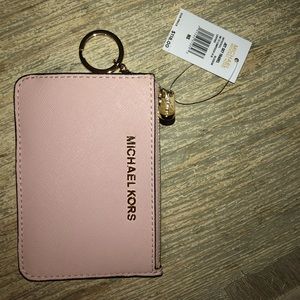 Brand new Micheal Kors key chain wallet